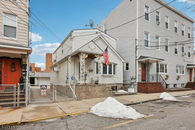 WELCOME ! Discover this charming and well maintained Colonial home nestled in the desirable Harrison neighborhood.