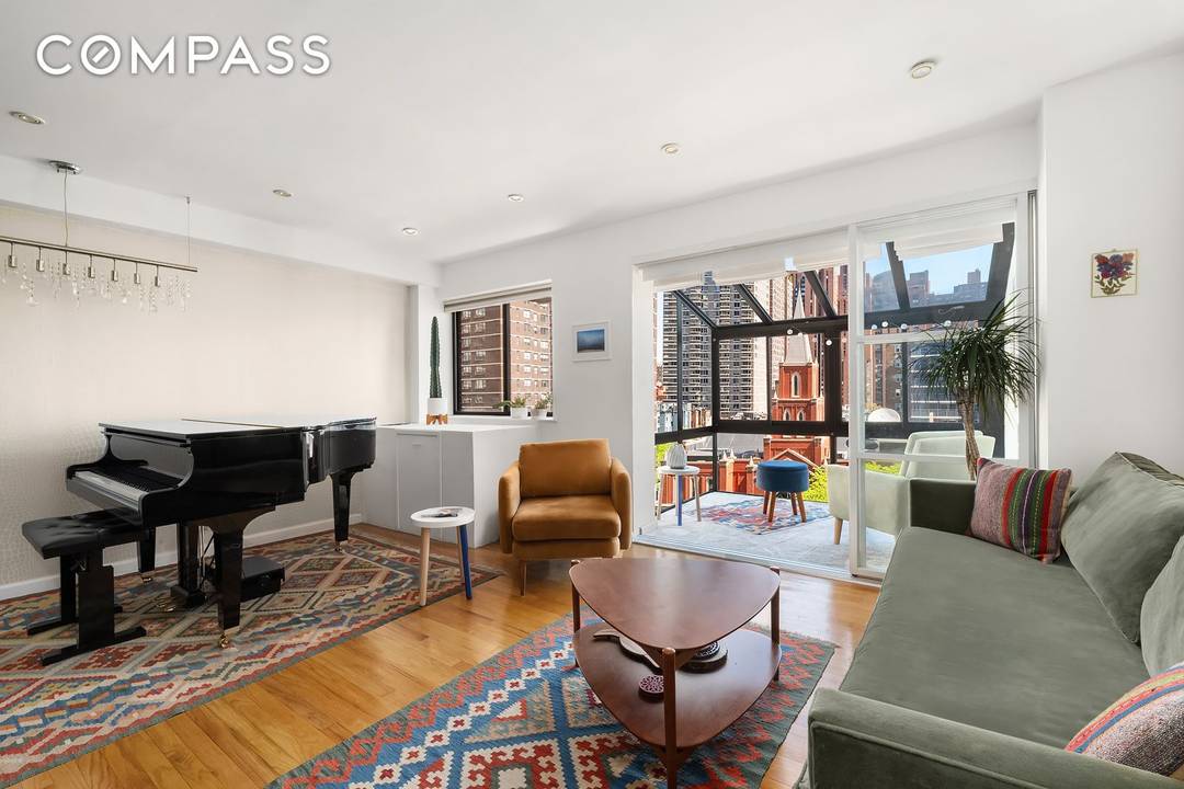 Welcome to residence 904, a truly unique, generously scaled triplex home with a sun drenched solarium or home office and a sizable, newly renovated kitchen.