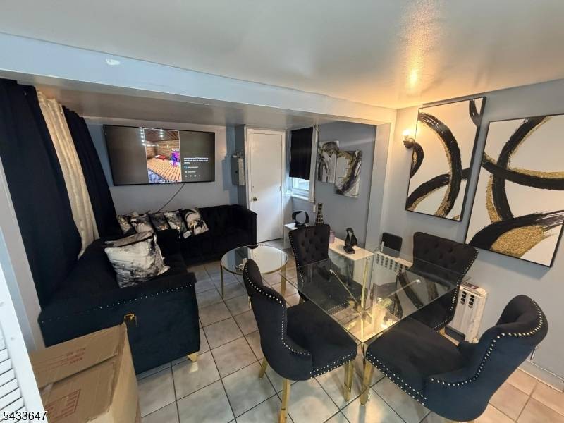 Excellent opportunity to own this two family home featuring a classic Colonial style layout.