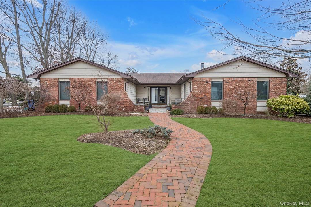 Beautifully set on a corner lot along a quiet street, step inside the grand atrium entrance leading to the great room which boasts a living room, formal dining room combination ...