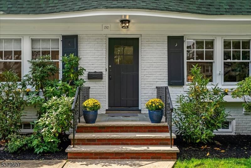 Set back on a deep, private property, on a wide, quiet street in the sought after Woods section, this sunny, spacious center hall classic is crisp and move in ready ...