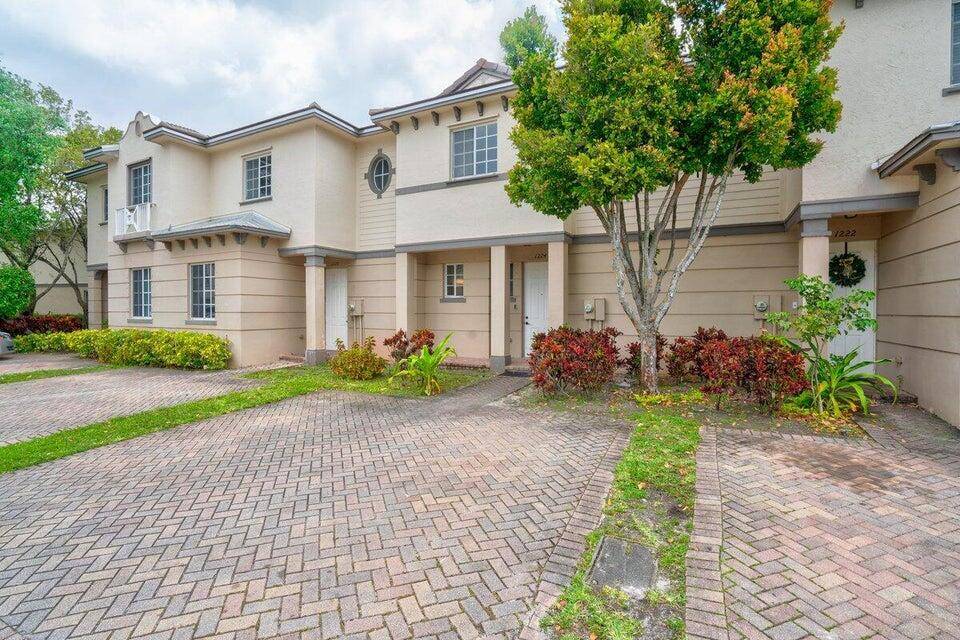Fully renovated beautiful townhome with newer stainless steel appliances, luxury vinyl flooring, brand new carpet upstairs, brand new bathroom vanities, light fixtures, faucets, and showerheads.