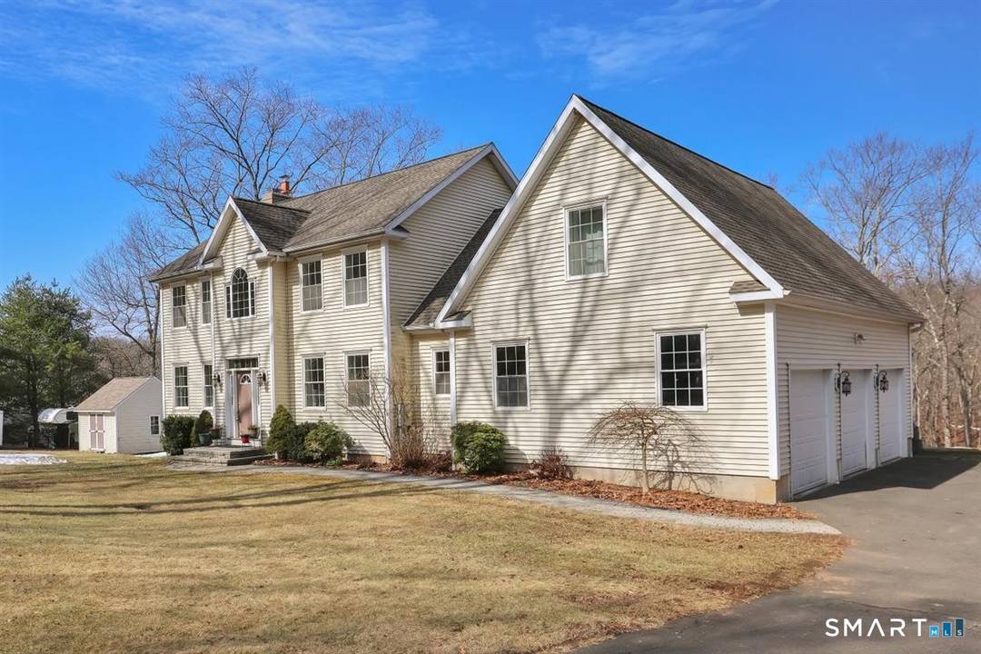 Nestled on a quiet deadend street among a collection of custombuilt homes, this stately colonial enjoys a rare frontrow view of more than 500 acres of protected state land.