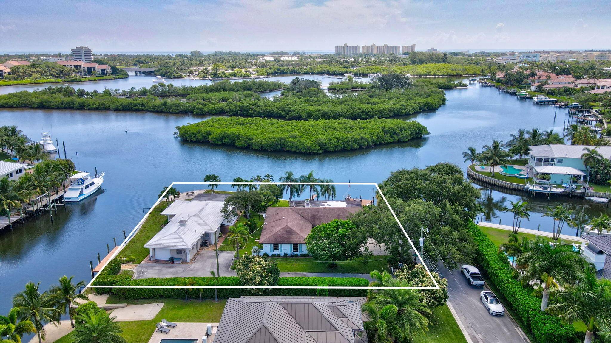 Prime Waterfront Development Opportunity A Boater's Paradise Discover the ultimate waterfront oasis in Jupiter !