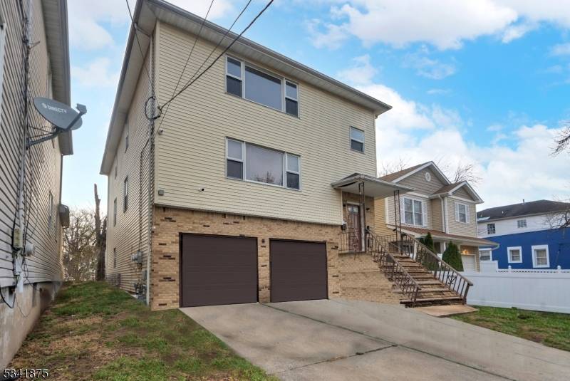Investor's Dream ! legal 2 family Home in Roselle NJ An Excellent Income Potential.