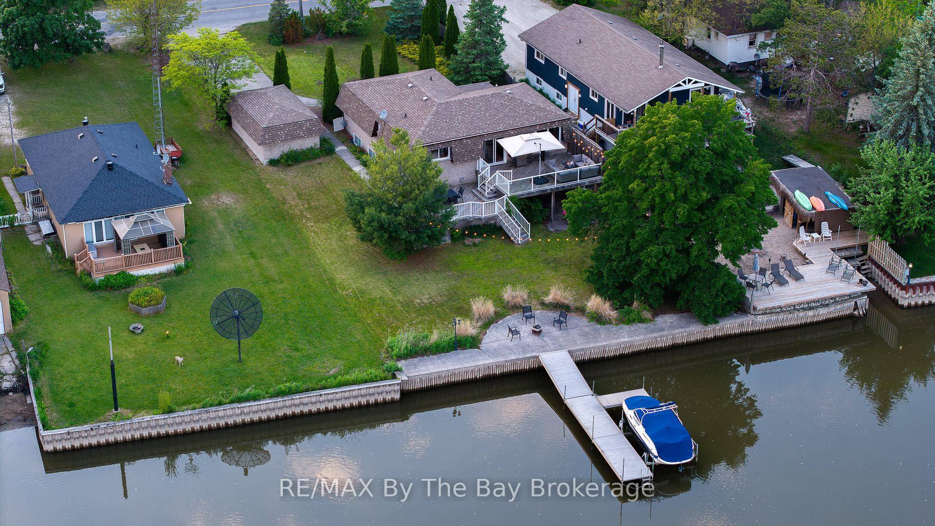 Waterfront retreat that offers year round living on the prime boating part of the Nottawasaga River in Wasaga Beach a convenient short walk to the pristine sandy shores of beautiful ...