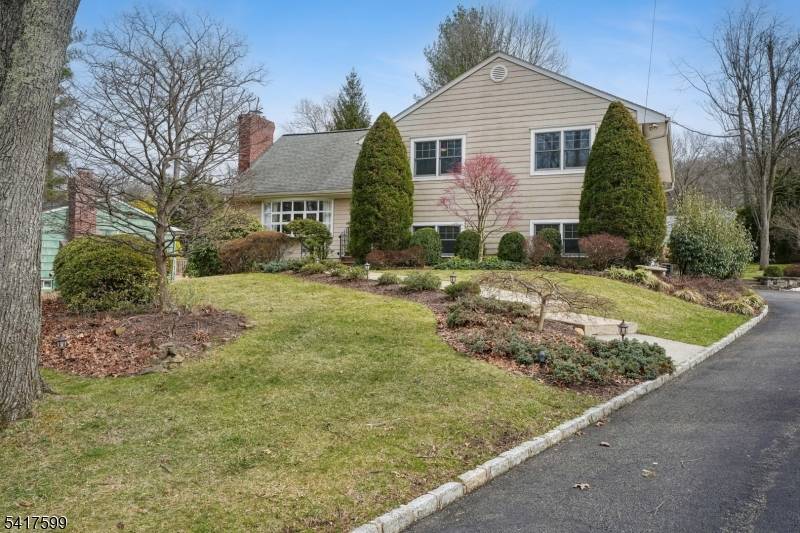 New Providence living at its best This is not your typical split level home.