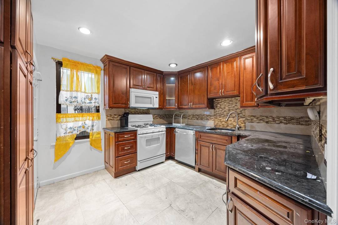 167 37 109th Road is a fully detached single family sitting on a 25x90 lot on a beautiful, tree lined street of Jamaica.