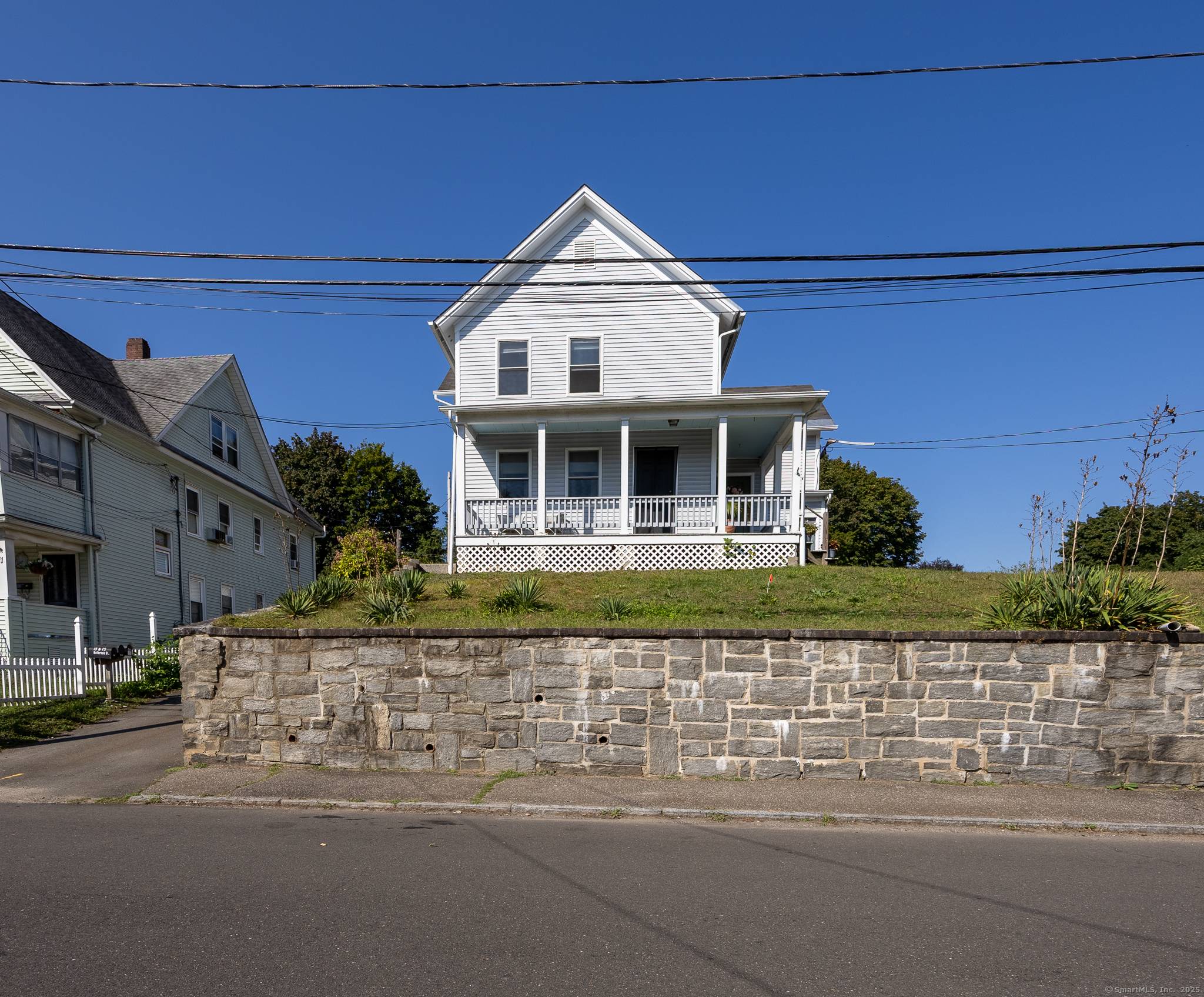 5 UNIT POTENTIAL This rare and versatile property offers exceptional income potential, featuring a two family home plus an expansive contractor's garage complex with the opportunity to create up to ...