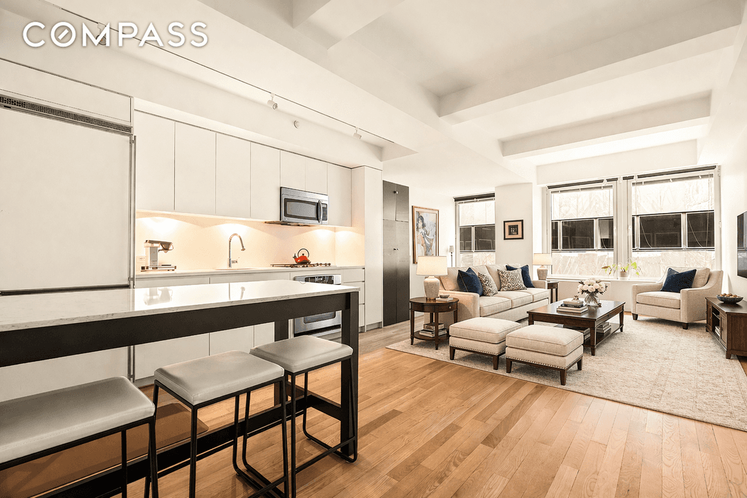 Welcome to Residence 15F, a versatile and sleek 845 square foot loft style apartment that perfectly balances style and functionality.