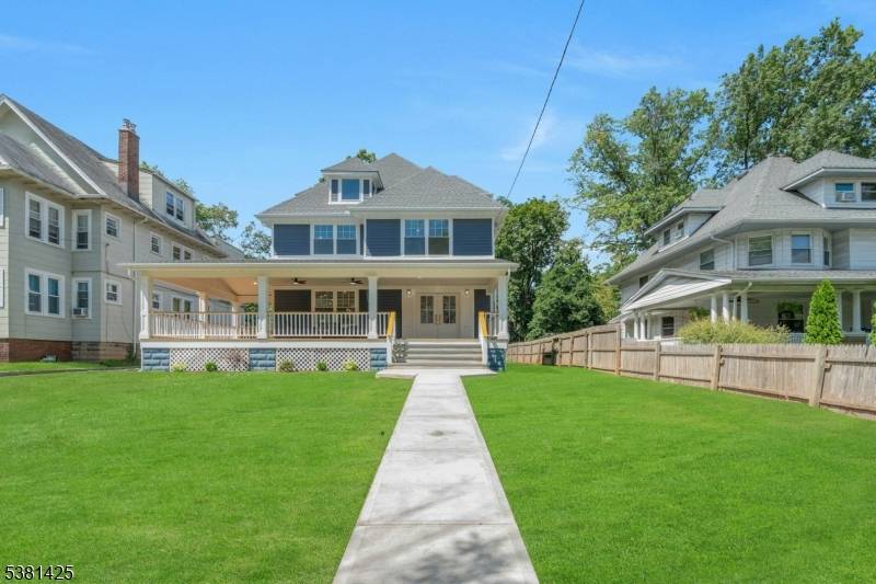 This fully renovated and meticulously restored traditional colonial home offers timeless elegance and modern convenience on nearly a third of an acre in Montclair.