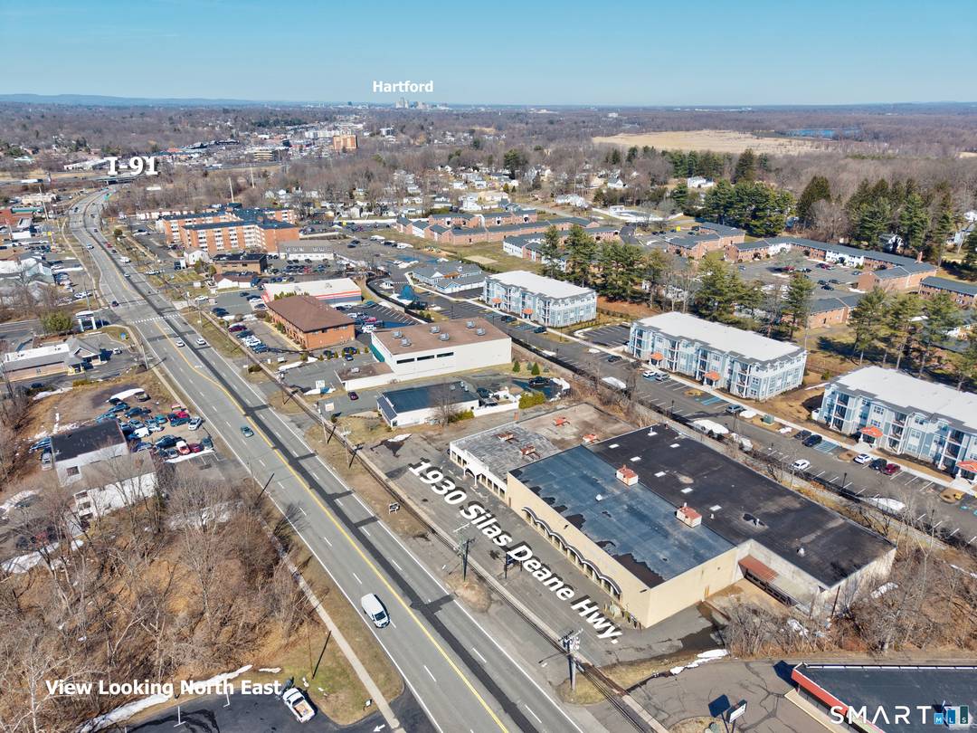 1930 Silas Deane Highway presents a rare opportunity to acquire a large scale commercial property located along one of Central Connecticut's most active retail corridors.
