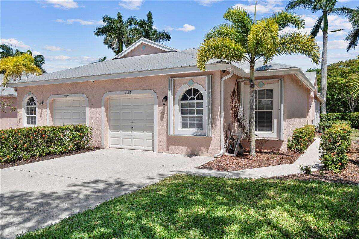 Welcome to this spacious and thoughtfully updated 2 bedroom, 2 bathroom villa located in the highly desirable community of Wellington's Edge.