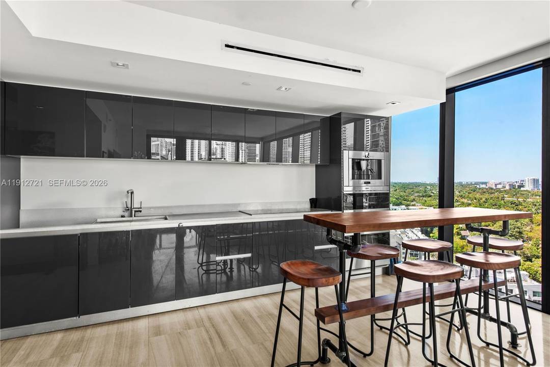 Step into LUXURY in this light filled CORNER UNIT with floor to ceiling glass windows at the Echo Brickell.