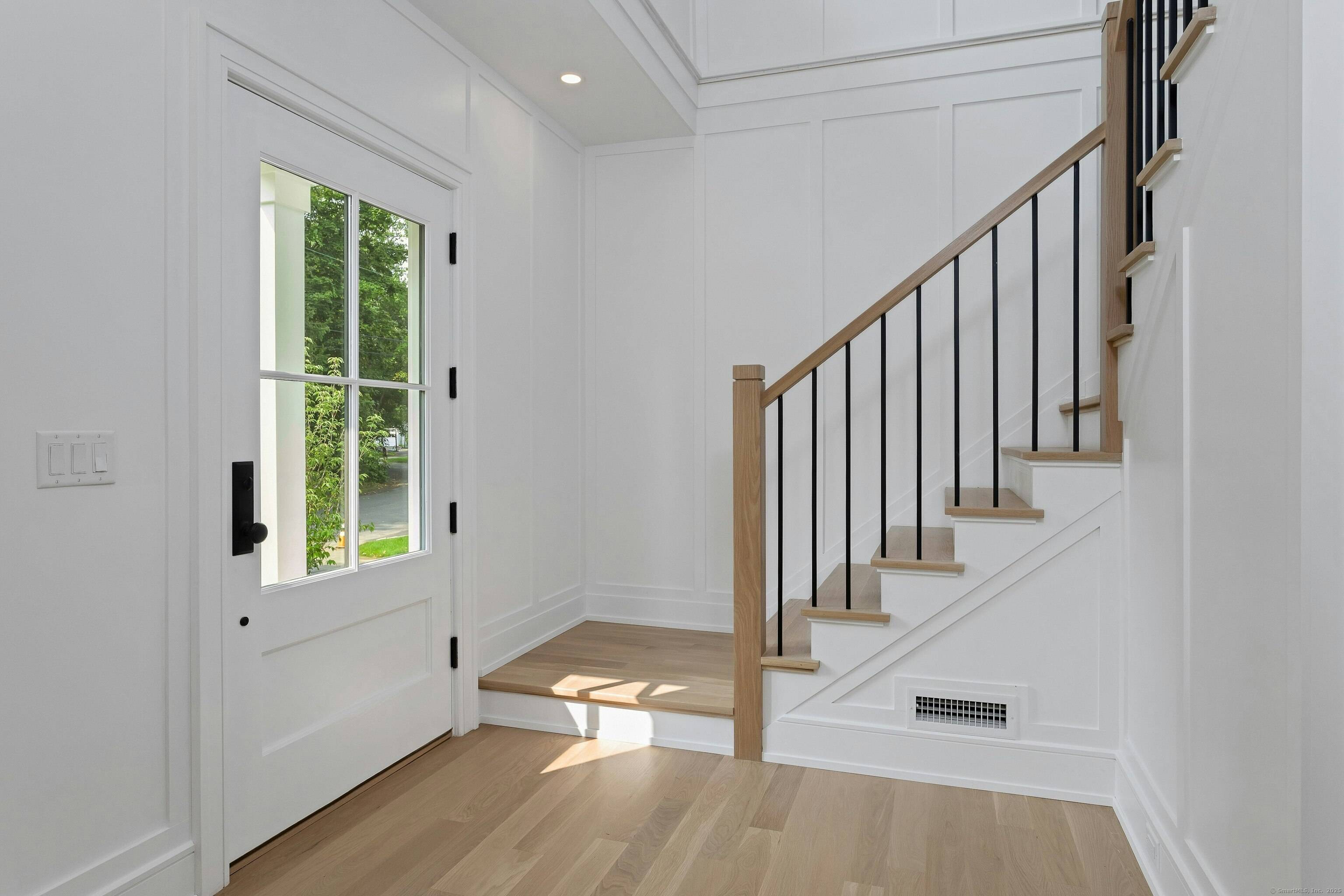 Spectacular, luxury new construction nestled in one of Darien's most lovely neighborhoods.