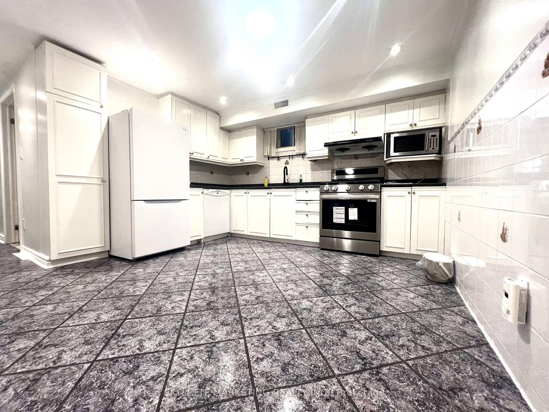 Spacious 2 Bedroom Basement Apartment in Prime Toronto Location !