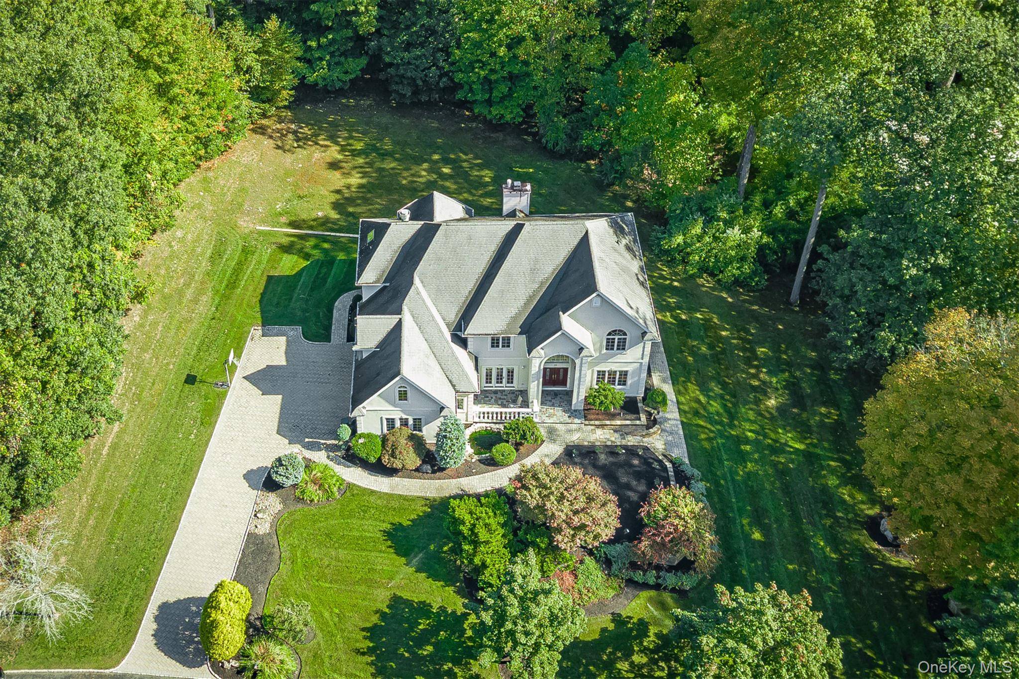 Welcome to a residence where timeless elegance meets modern sophistication.