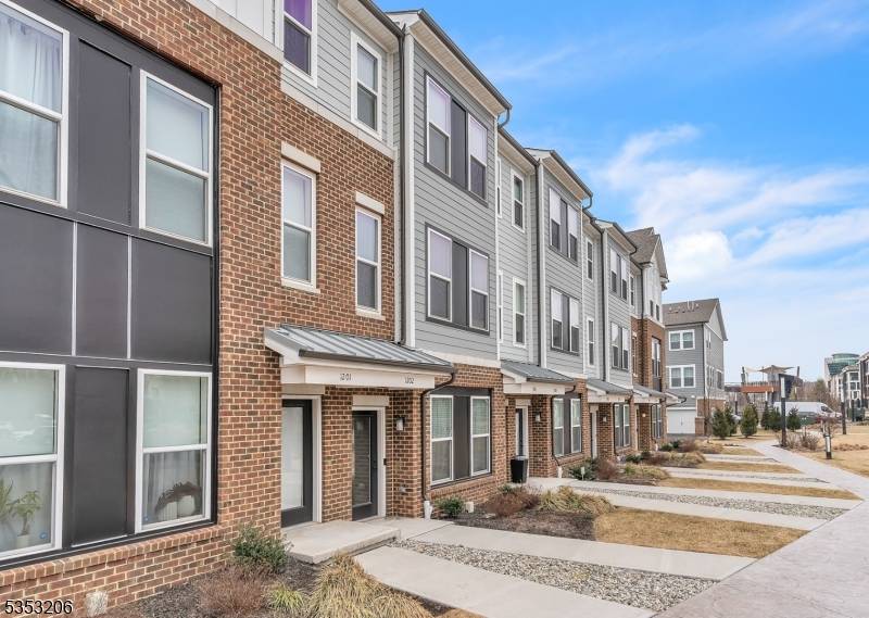 Newer Construction ! Rare opportunity to own at The Townhomes at Vermella, This townhome offers builder upgraded floors, cabinets, counters, electric car charging capabilities much more !