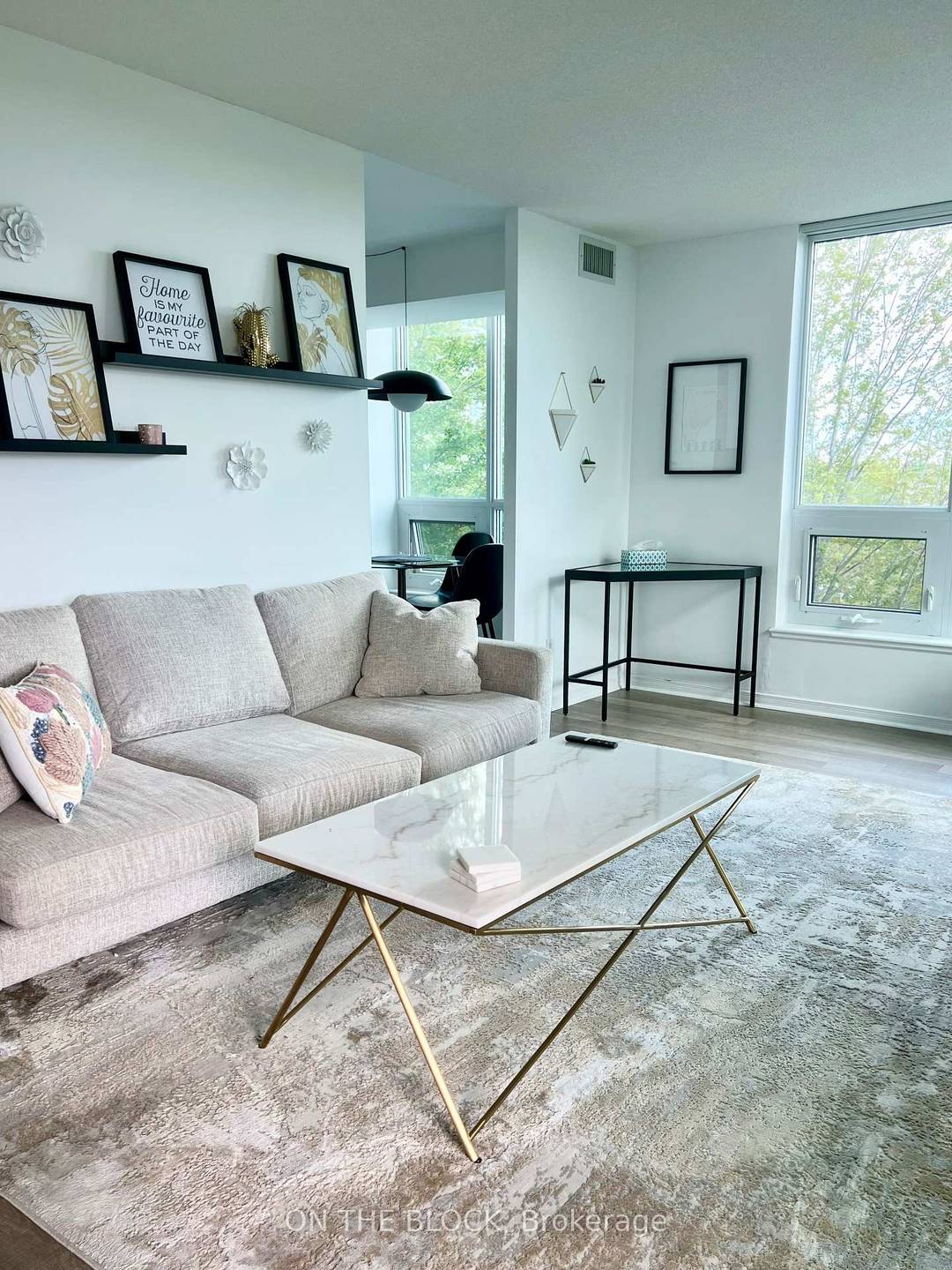 Spacious, bright, beautifully maintained and thoughtfully furnished 950sf corner unit available for mid term or standard lease.