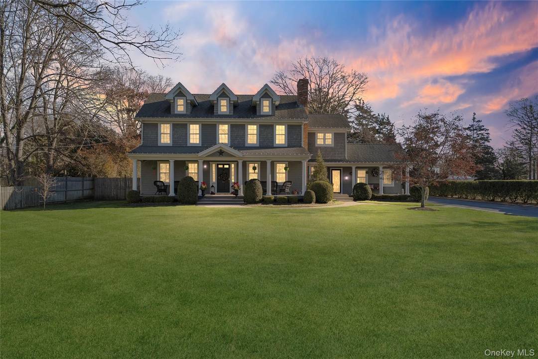 Welcome to this Exceptional South Bayport Colonial, where classic meets modern luxury.