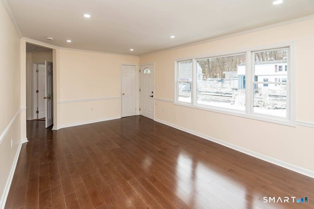 This thoughtfully renovated Cape Cod offers the perfect blend of classic charm and modern comfort.