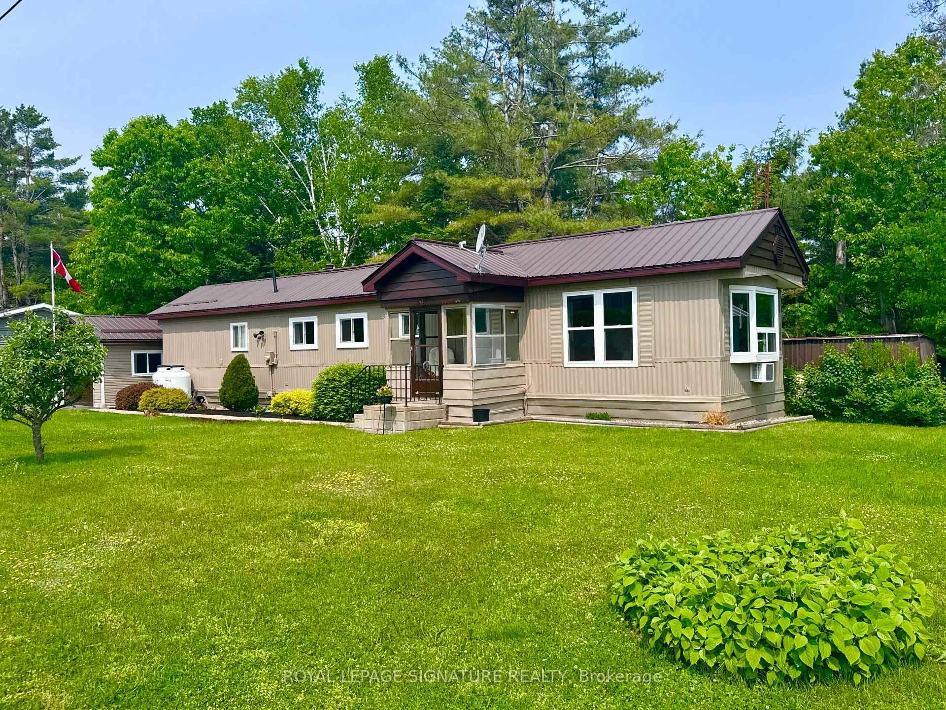 This renovated two bedroom, one bath home is nestled on a serene, 55 years plus established community Hunter Creek Estates sits a wooded back lot adorned with beautiful trees, providing ...