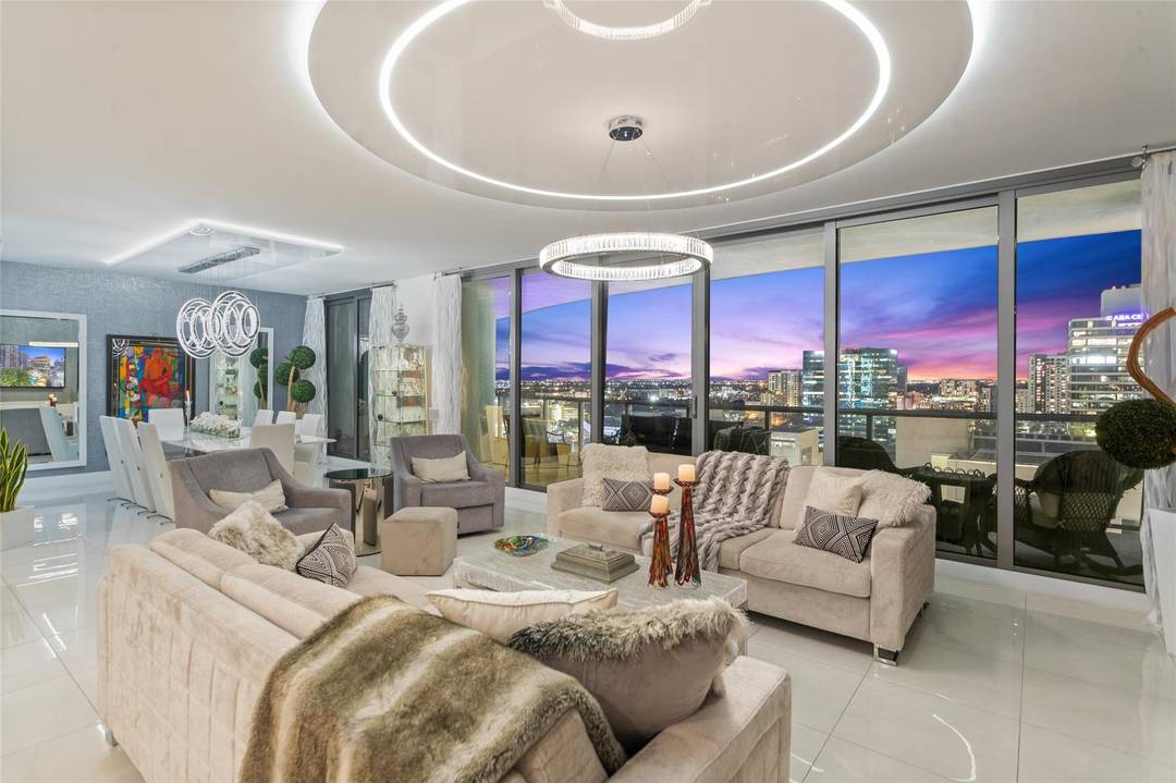 Step into this designer inspired corner residence, Nestled in the prestigious Las Olas district, Features 3 bedrooms 2.