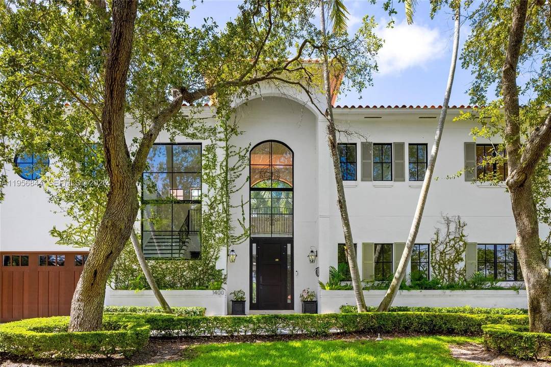 Nestled within the highly sought after, guard gated community of Gables by the Sea, this beautifully renovated two story residence seamlessly blends Mediterranean charm with Modern sophistication.