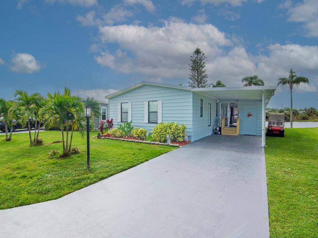 COME AND SEE this beautifully UPDATED WATERFRONT home in the 55 community of Pinelake Gardens !