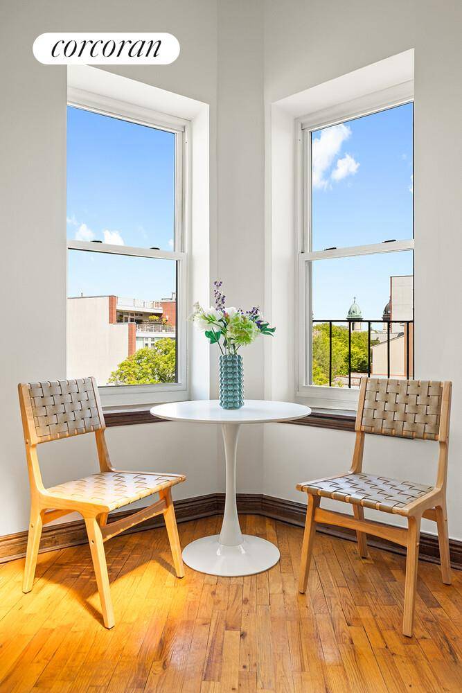 Perched atop a pre war four story pet friendly coop, this charming one bedroom apartment with deeded roof rights offers a rare blend of historic character and modern comfort on ...
