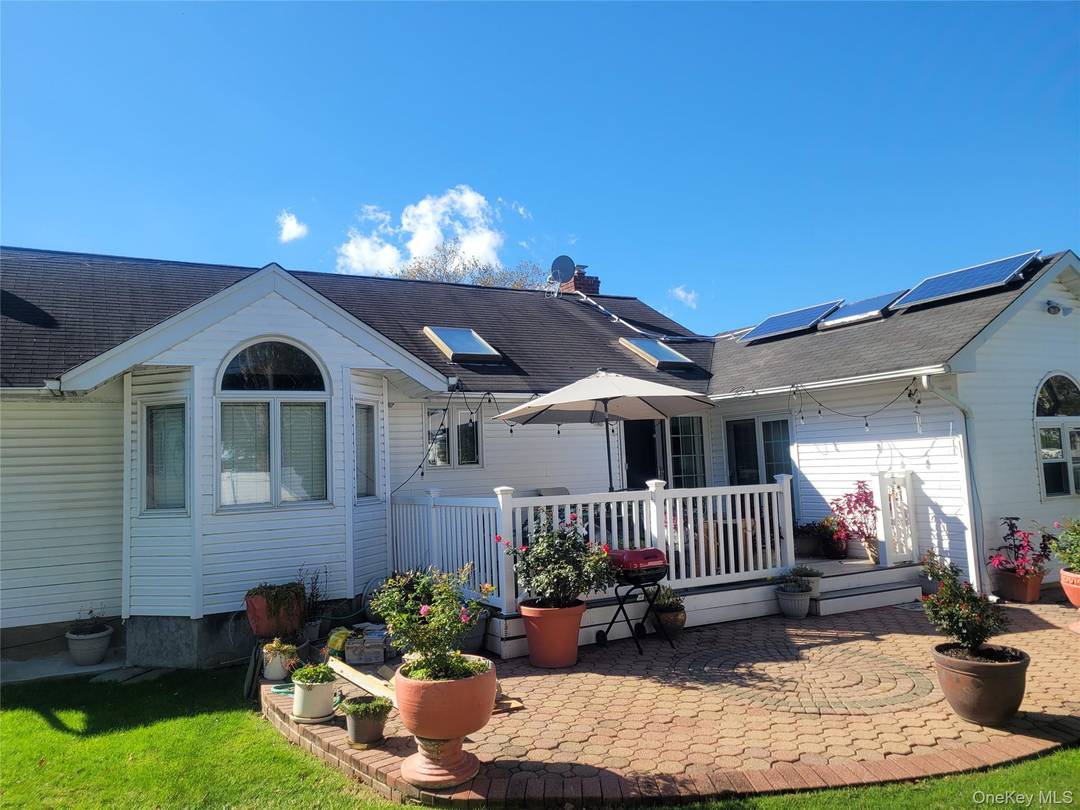 Welcome to Elmont ! This Sprawling Raised Ranch is Perfect for Relaxation or For Entertainment.