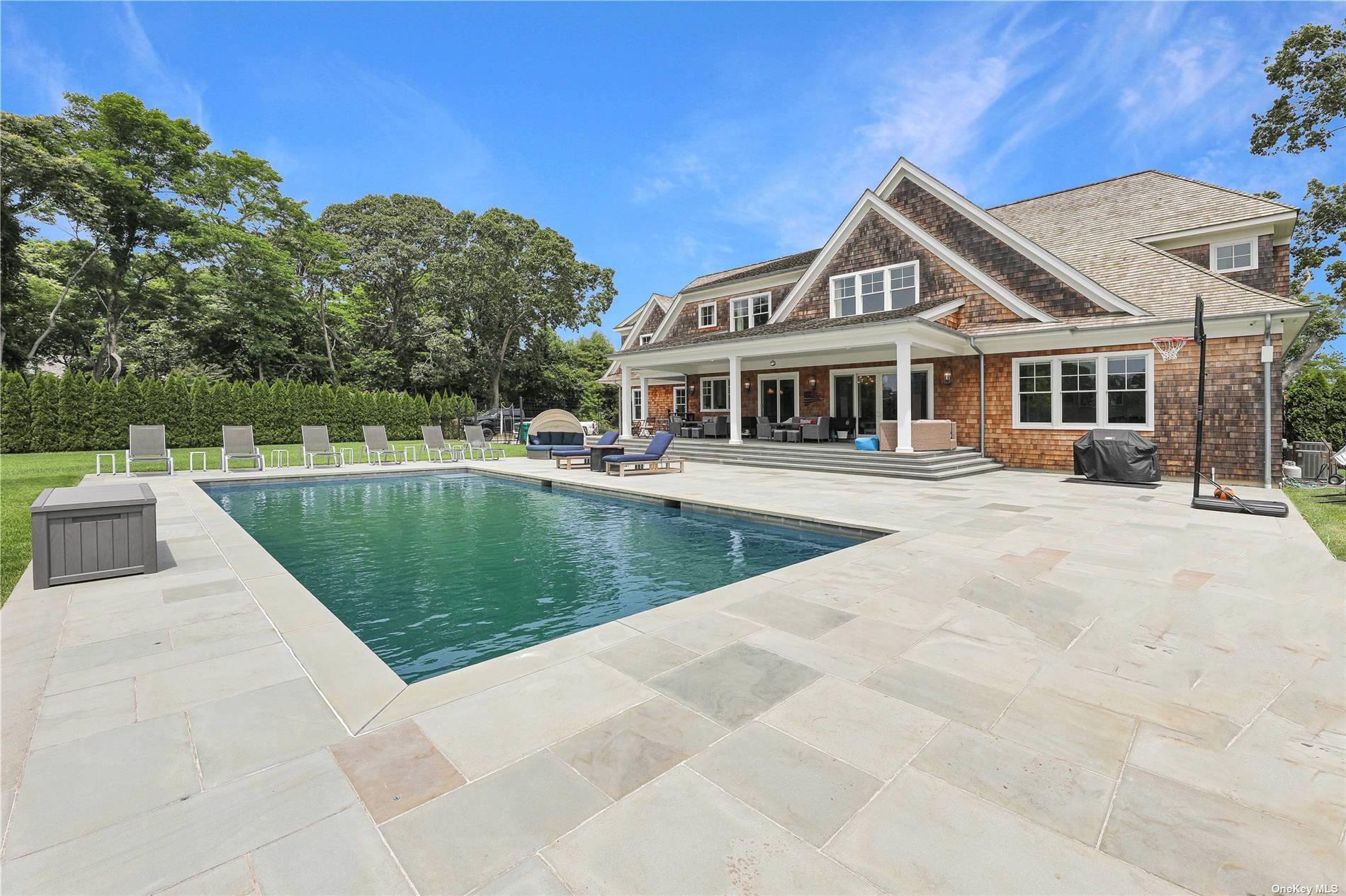 AVAILABLE DATES JULY 26TH AUGUST 27TH Nestled on nearly an acre of pristine land in Westhampton Beach Village, this astonishing abode embodies the epitome of Hamptons luxury living.