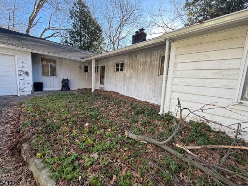 This 3BR ranch offers single floor living and a unique opportunity for restoration and renovation.
