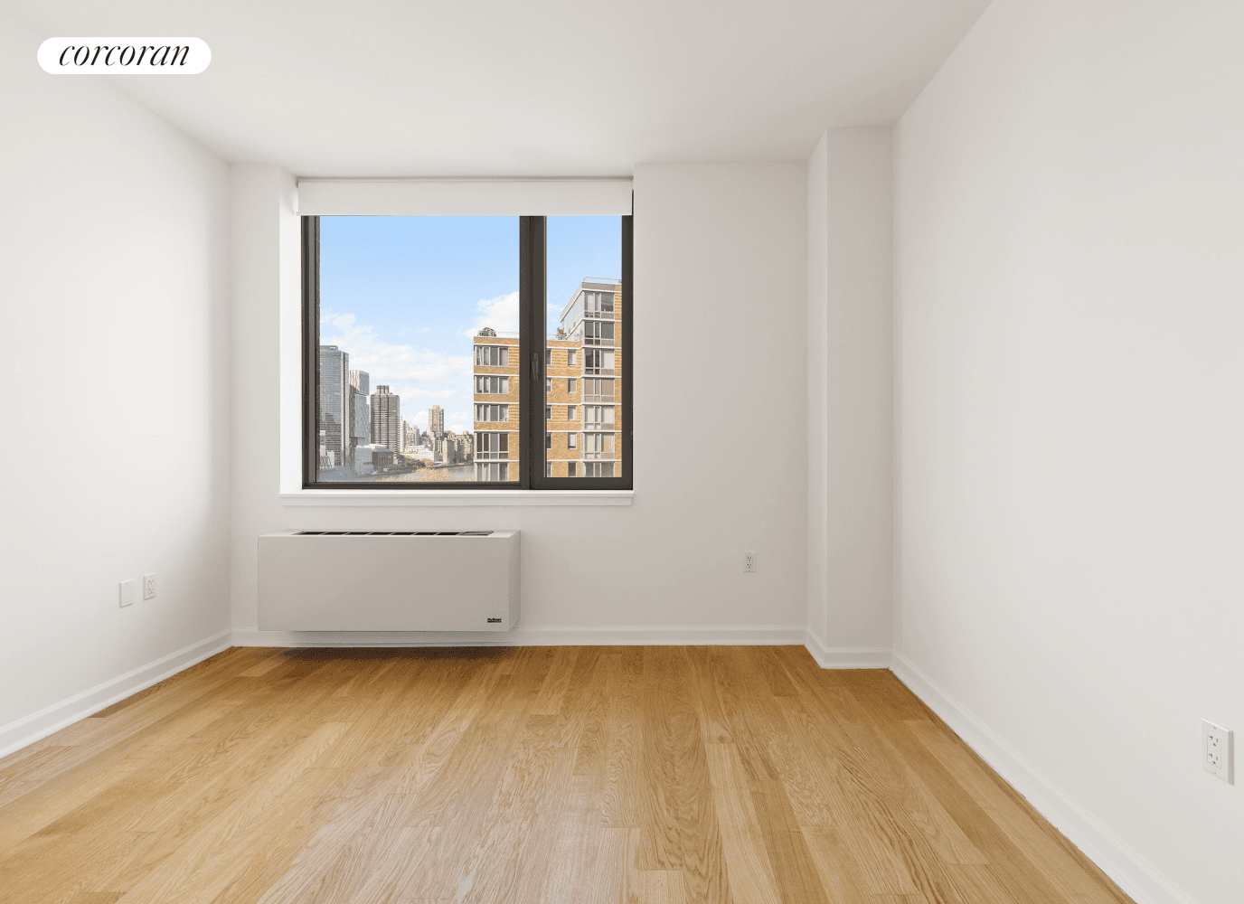 Welcome to 425 Main Street, 14A, a bright and airy one bedroom apartment offering stunning north and northwest views of the iconic Manhattan skyline.