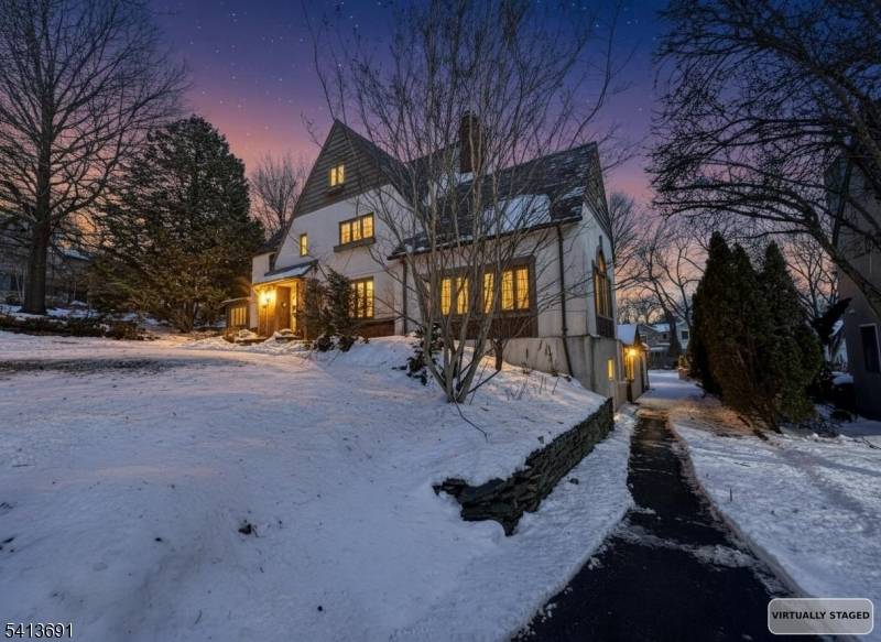 Welcome to this spacious Tudor style Colonial located in the desirable borough of Glen Rock.