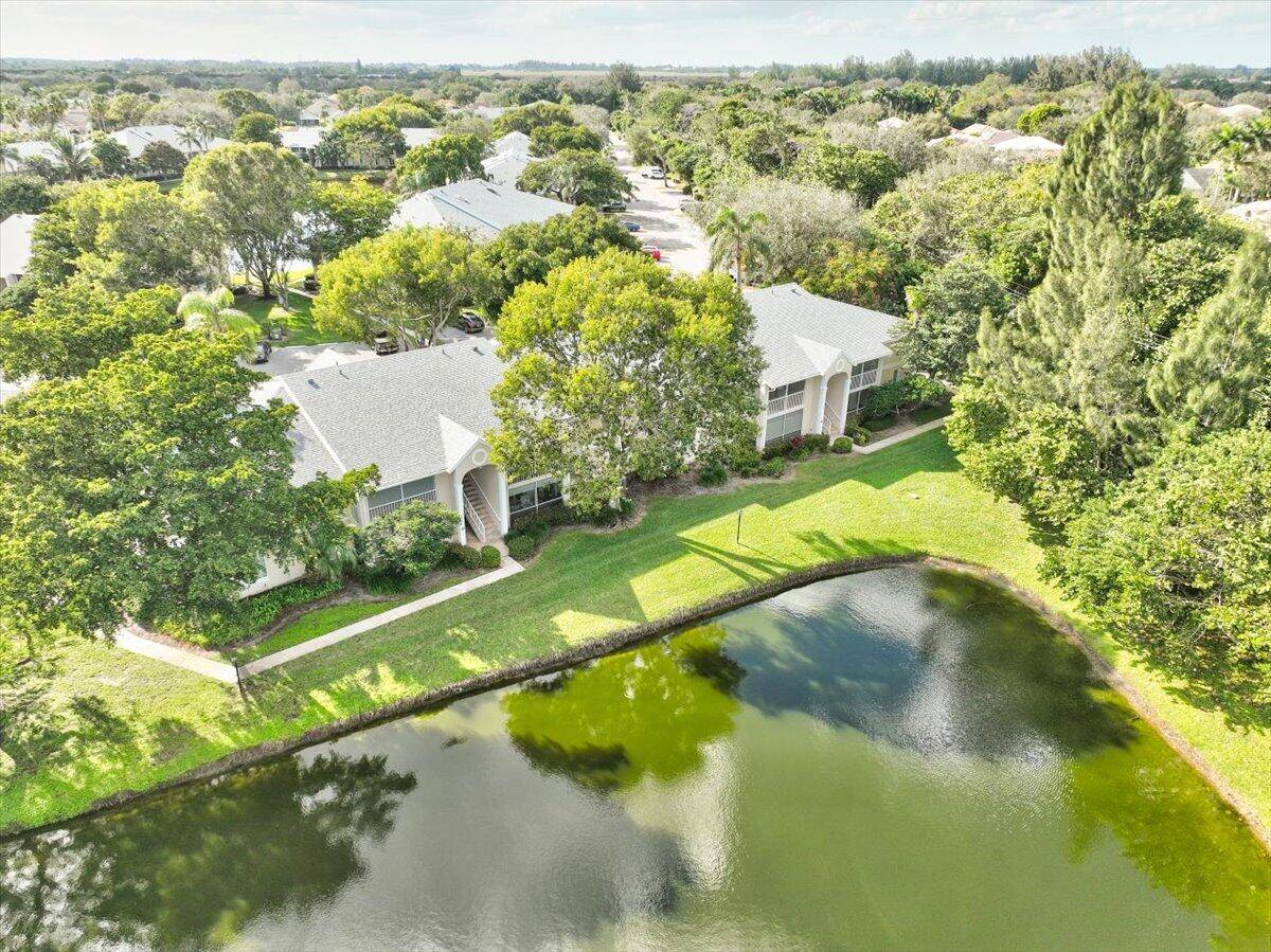 This meticulously kept 1st floor condo offers a tranquil retreat with stunning lake views, all within a prime location in Central Delray.