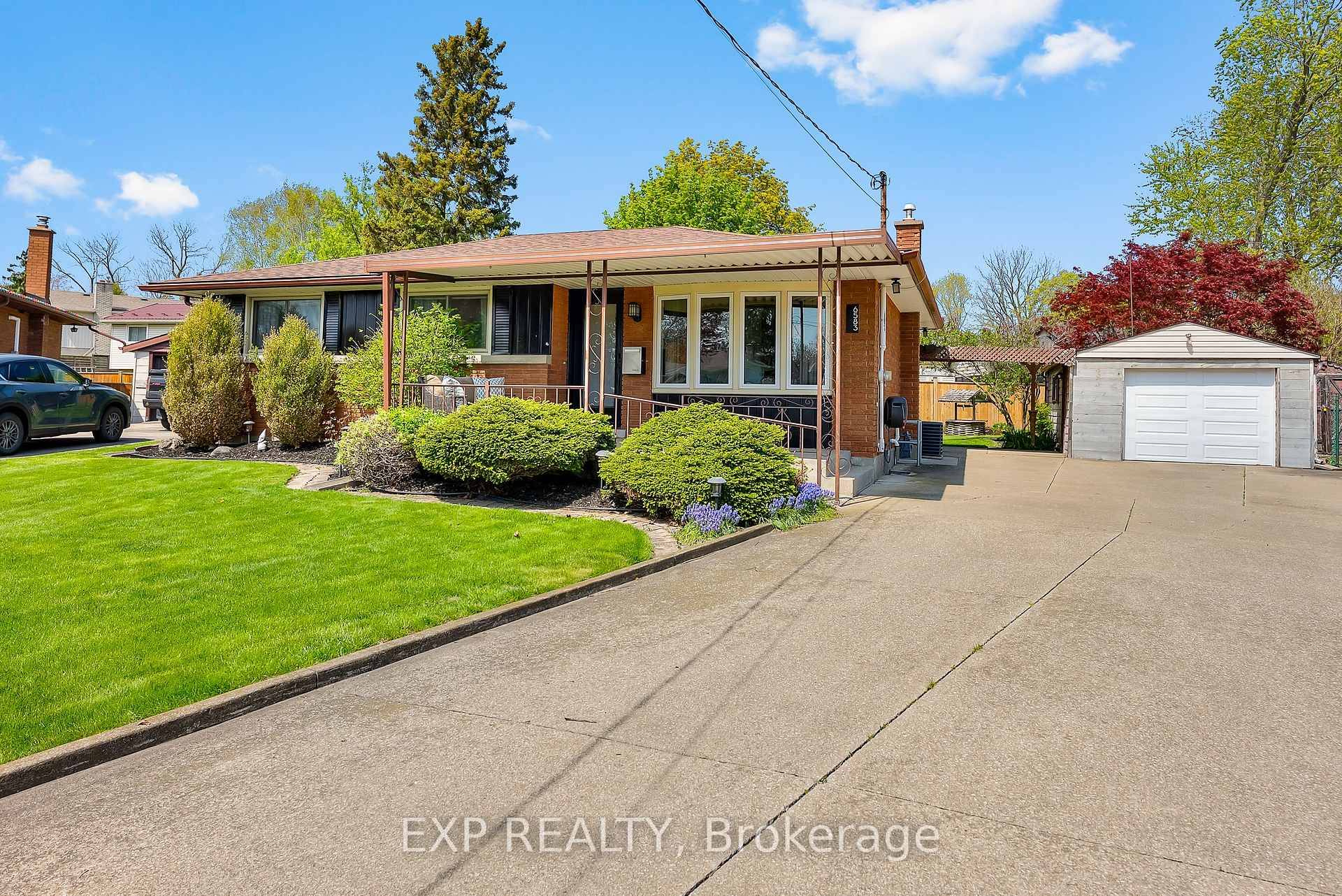 Tucked away on a quiet family friendly cul de sac, this charming all brick two bedroom bungalow sits on a spacious pie shaped lot.