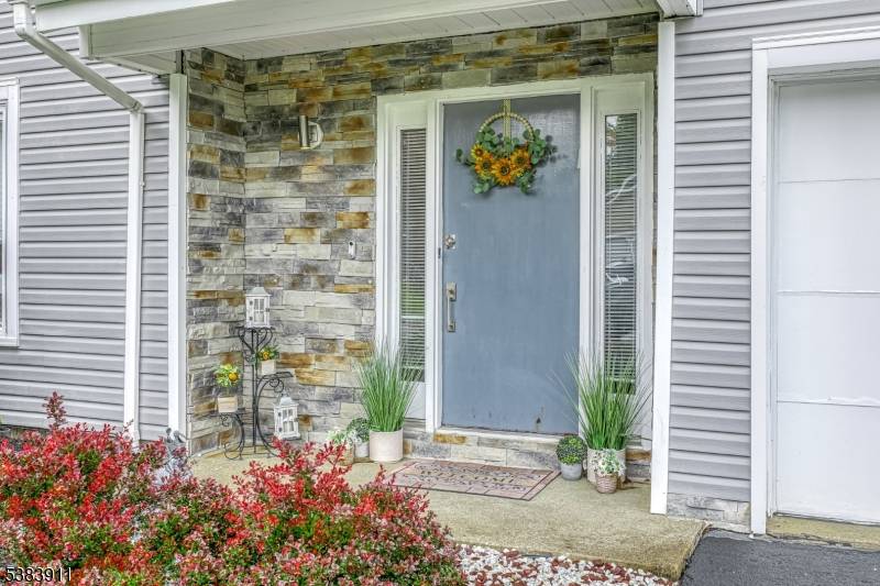 Discover this stunning 3 bedroom, 3 bath remodeled contemporary in the desirable Point View Estates community.