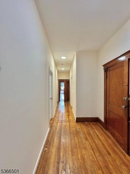 Freshly renovated 7 bedroom, 2 bath apartment on the 2nd floor with hardwood floors and a spacious eat in kitchen.