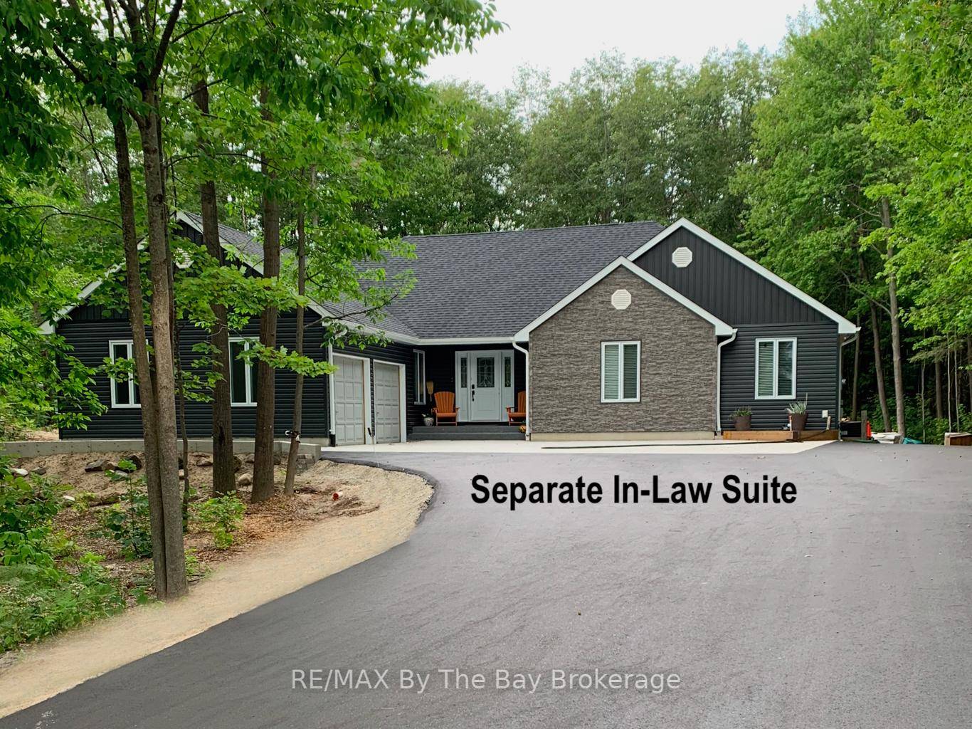 Nestled in the trees of Sunward Estates, this beautifully updated bungaloft offers approx.