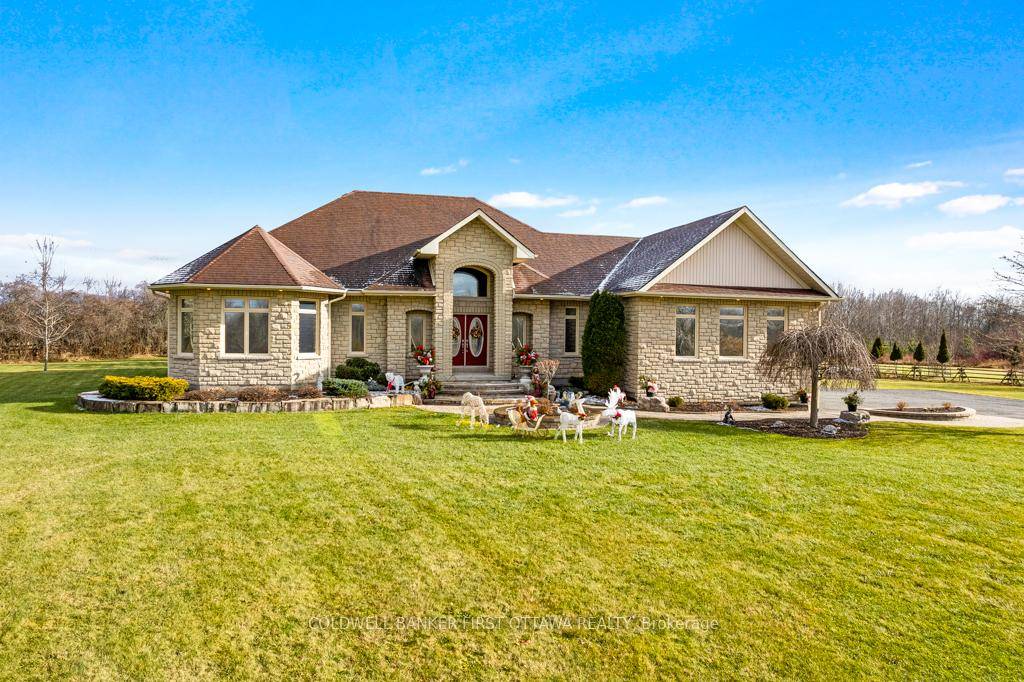 Grand elegant living spaces in executive 2003 bungalow that offers exquisite finishings.