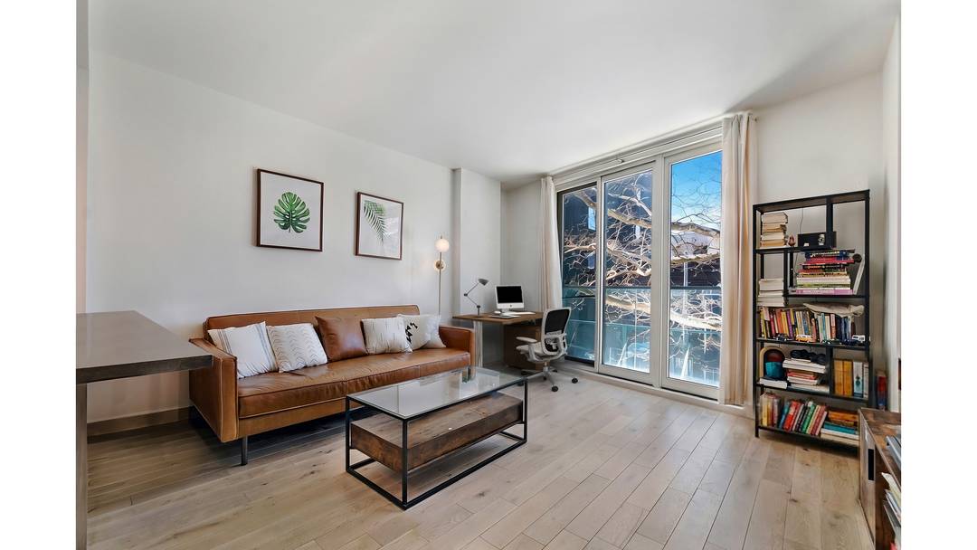 Residence 2B is an oversized, west facing one bedroom home filled with beautiful natural light and open sky views.