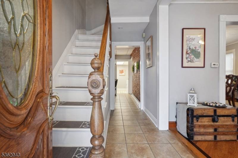 Picture perfect, engaging colonial, situated above street level, large deck area, updated and freshly painted inside, hardwood floors, newer kitchen, first floor laundry, den and finished basement area with half ...