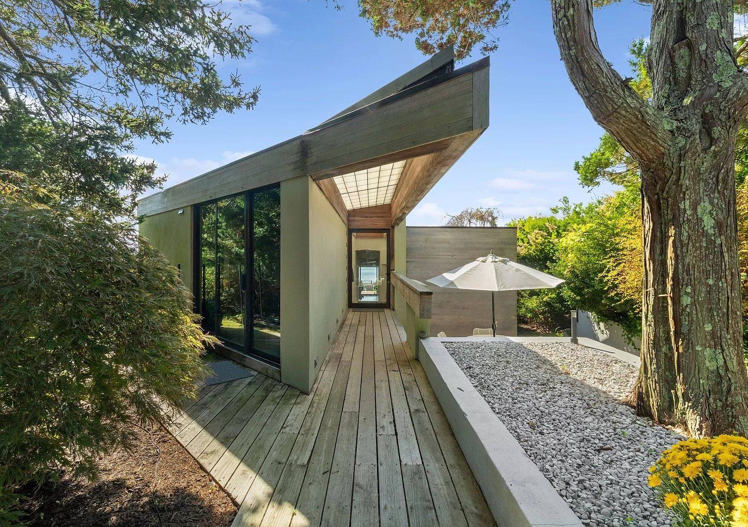 Gorgeous stylish home on bluff with incredible views out across Shinnecock Bay and out to Ocean !