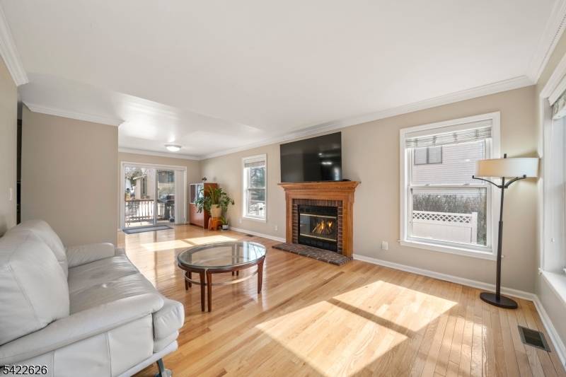 Welcome to this well maintained Colonial style home in one of Denville's most desirable lake communities, located on North Shore Road.