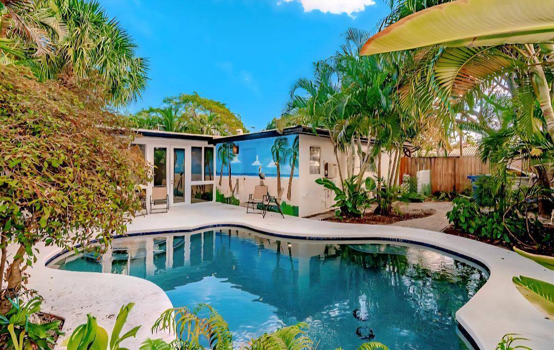 Experience the charm of this exceptional single family home, boasting a delightful heated pool that invites you to unwind under the sun.