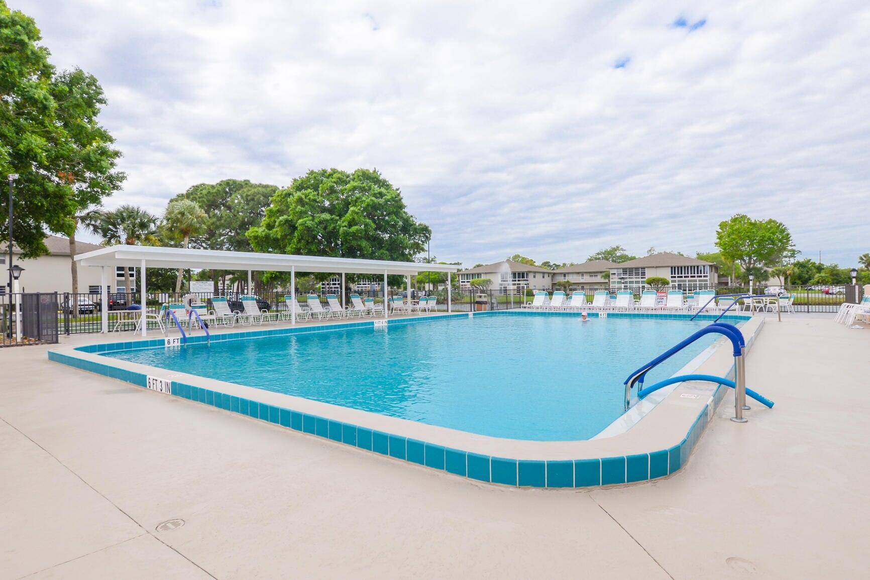 Welcome home to this beachy and bright, 2 2 concrete block condo with lovely lake view from your private lanai.