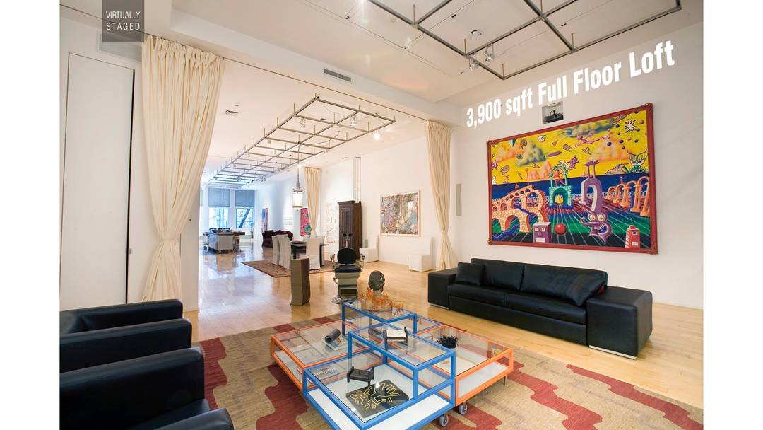 This magnificent loft, situated at 519 Broadway in SoHo, embodies urban elegance.