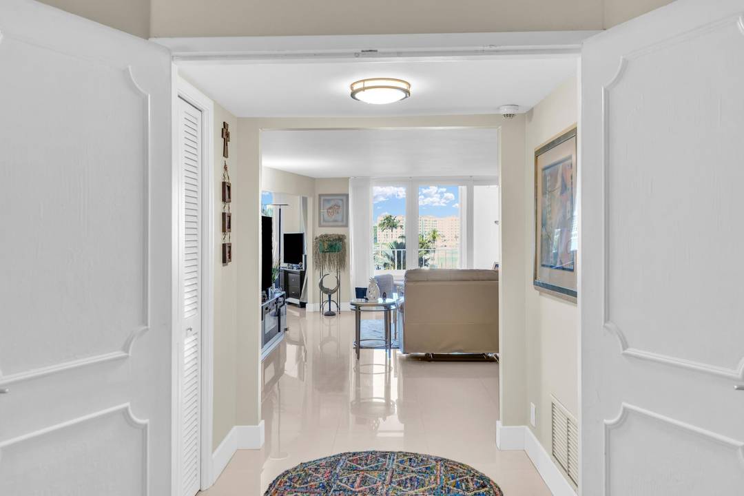 Experience luxury coastal living with breathtaking views of Lake Boca from every room.