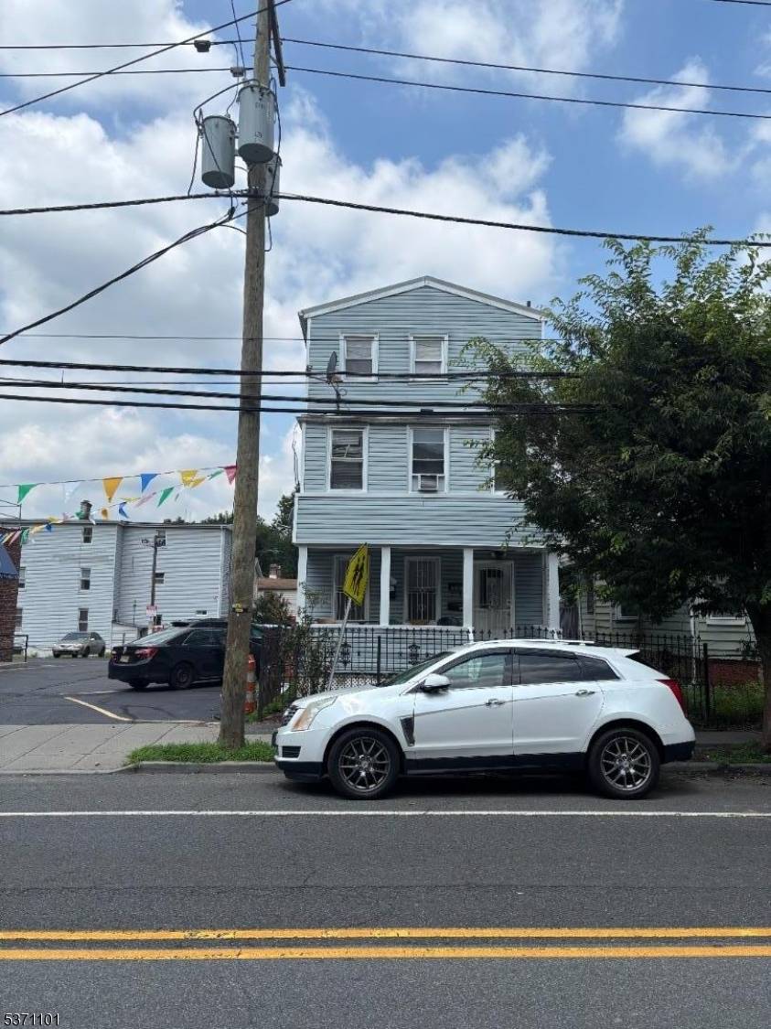 Price Improvement ! Well maintained and spacious, this property features two separate units.